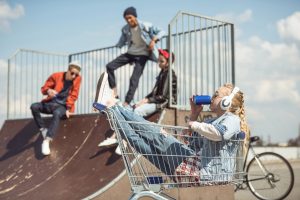 teenagers with their friends at a playground